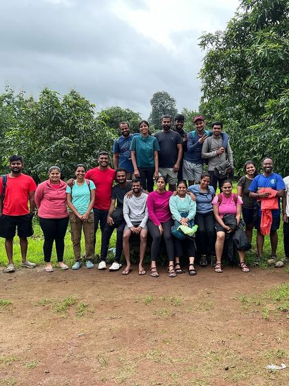 A group photo from a Maharashtra trek, with everyone looking ready for the next adventure.