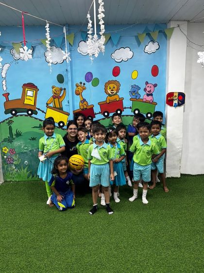 A group photo from our workshop with pre-schoolers. It's amazing to see their excitement and energy as they learn the basics of basketball.