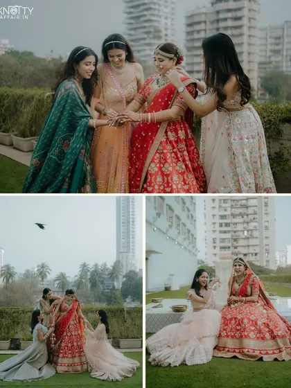 The bride sharing a moment with her bridesmaids. We take time to create beautiful group portraits with your bridal party.