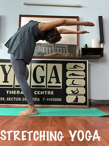 This standing backbend demonstrates spinal flexibility and control. It's an energizing pose to counter long hours of sitting.