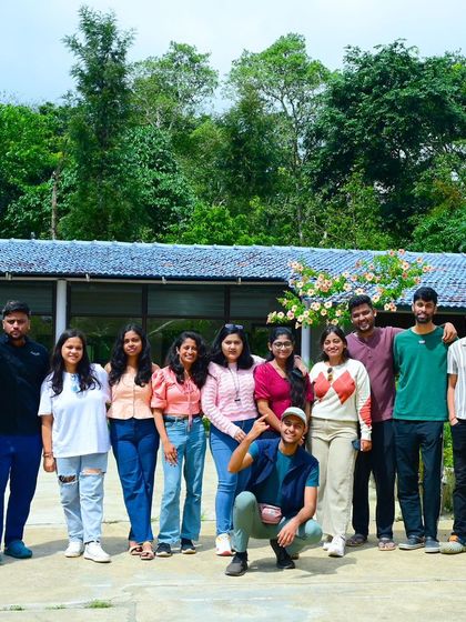 A full group photo at our partner homestay in Sakleshpur. It's the perfect base for exploring the surrounding hills and waterfalls.