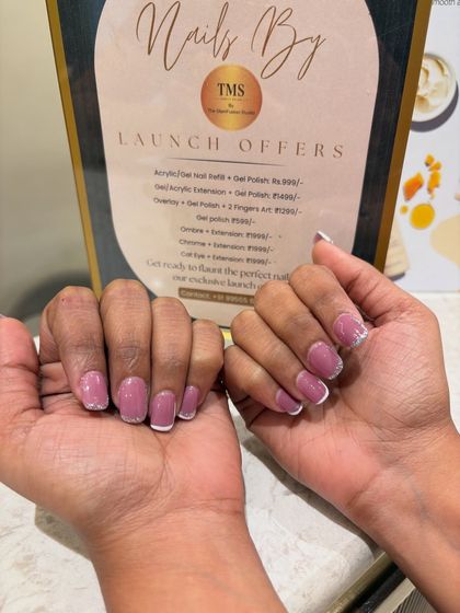 Here are the mauve and glitter nails next to my launch offers menu. It’s a great way to see the beautiful results you can get right here in the salon.