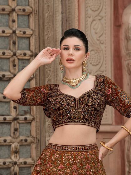 A close-up of the blouse from our "Bridal Saga" lehenga, showing the detailed craftsmanship and beautiful neckline.