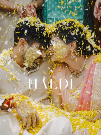 In a shower of marigold petals and pure joy, this is the heart of a Haldi ceremony. I focus on these unscripted moments of laughter and connection, where the turmeric paste becomes a paint of happiness.