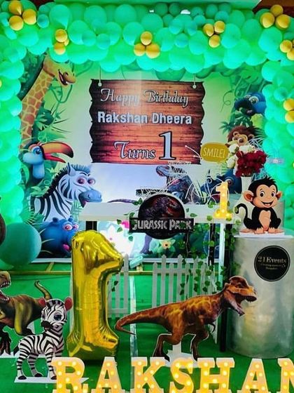 A Jurassic Park inspired theme, mixing friendly dinosaurs with jungle animals for a prehistoric adventure.