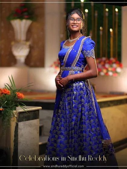 "Celebrations in Sindhu Reddy" - a full view of the young client in her stunning blue lehenga.