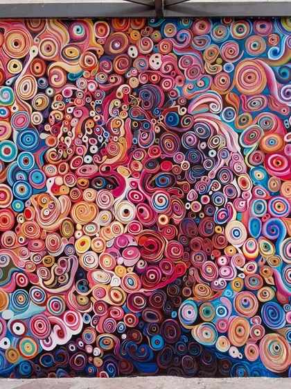 Showcasing our modern and abstract capabilities, this large-scale Marilyn Monroe portrait was created for a Bangalore cafe. The entire image is composed of thousands of colorful, hand-painted swirls, creating a stunning visual illusion.
