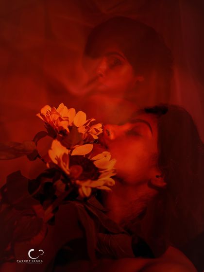 Another take on the double exposure concept, this time focusing on the sensory experience of smelling the flowers. It's a portrait of a memory or a dream.