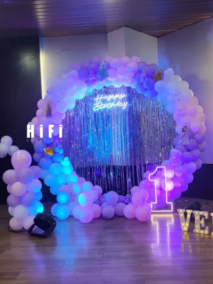 A wider view of the Frozen-themed birthday setup, showing how it fills the space.