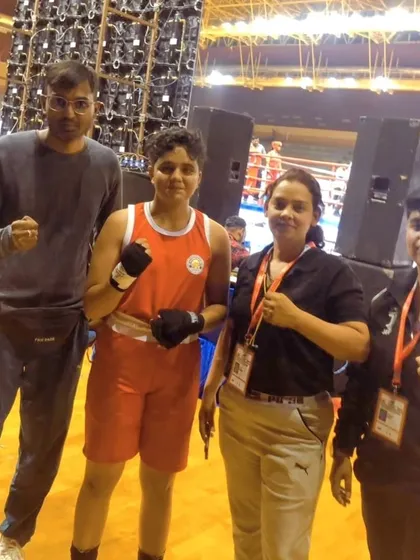 Another shot of our national-level sub-junior boxer Shanaya Yadav with the coaching team. We build a strong support system for our fighters.