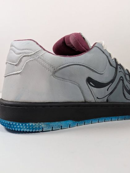 A side view of the Venom kicks, showing the symbiote design wrapping around the heel.