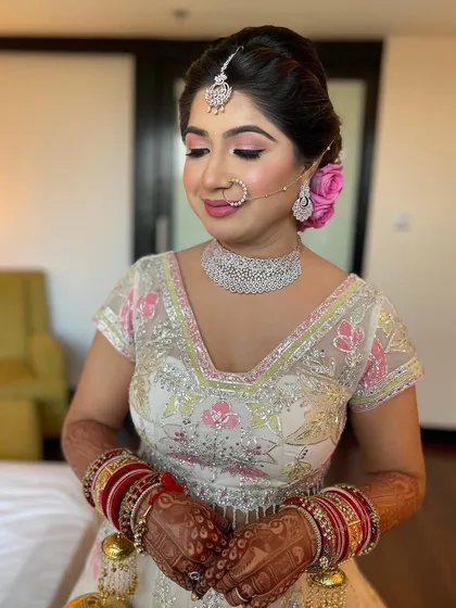 The final bridal look, complete with a beautiful updo that is both traditional and fresh.