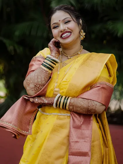 A candid photo capturing the bride's happiness and vibrant energy.