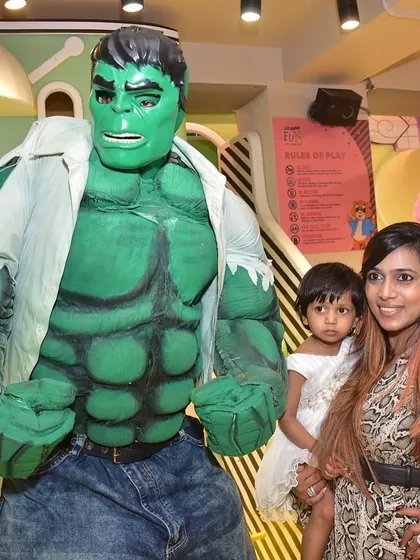 A young guest isn't intimidated by the incredible Hulk! Getting to meet and take a picture with a larger-than-life hero is a dream come true for many kids.