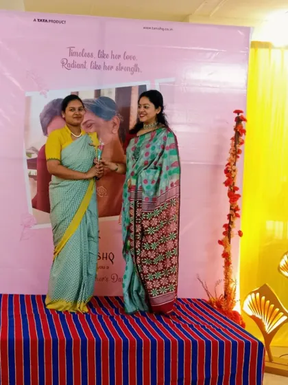 Interacting with a guest on stage during the Mother's Day event at Tanishq. Making each person feel special is a crucial part of my hosting style, especially during intimate in-store gatherings.