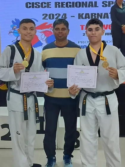 Victory. Two of our black belt students with their gold medals at the CISCE Regional Sports competition. I stand with my champions.