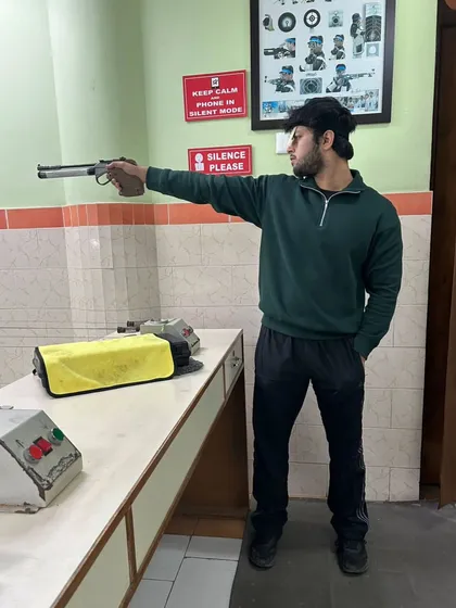 Discipline is everything. This shooter demonstrates a perfect one-handed stance, showing the stability and control that we practice relentlessly in every session.