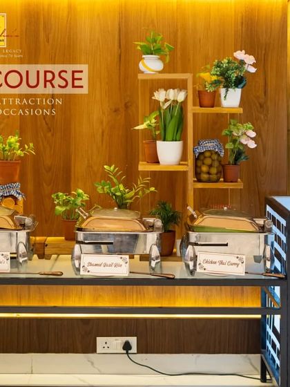 This main course station, set against a modern wooden backdrop, showcases our versatility in adapting our setup to different event aesthetics while maintaining our signature elegance.