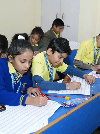 The focus in this room is electric. Here, my students are concentrating hard during a national level competition. This picture captures the dedication and seriousness they bring to the table after months of fun-filled practice.