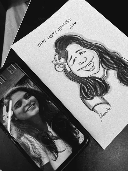 Here’s how it works. You send me a photo, and I turn it into a unique piece of art. This black and white caricature shows the transformation from a phone picture to a hand-drawn keepsake.