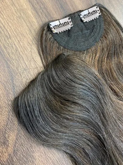 Here are my clip-in side bangs, designed to add volume and a soft, face-framing effect. They are a great way to add bounce and style around your face.