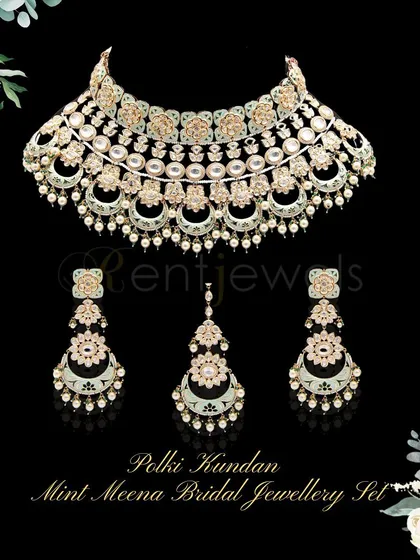 A product shot of my stunning Polki Kundan mint Meena bridal jewelry set. This enchanting beauty is one of my favorites and is available to rent for your wedding.