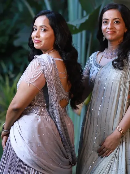 A gallery celebrating family bonds through fashion. These images feature more moments of mothers, sons, sisters, and other family members dressed in beautifully coordinated custom outfits for their most important events.
