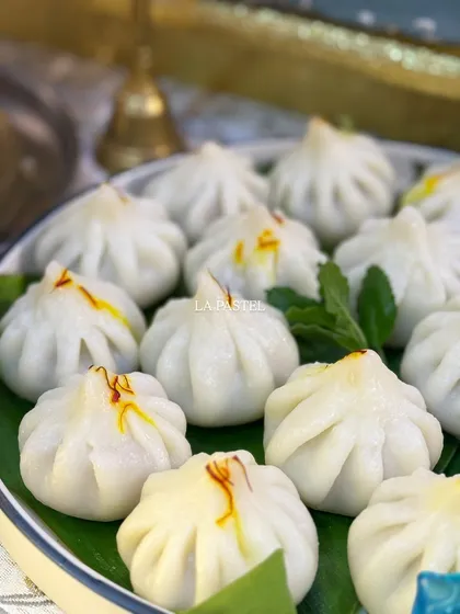 My classic Ukdiche Modaks, plated and ready for Bappa. Each one is handcrafted, steamed just right, and topped with a touch of saffron for that authentic festive feeling. 🫶🏻