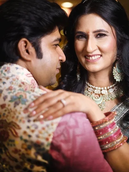A close-up shot capturing the loving gaze between the newly engaged couple. The bride's smile says everything.