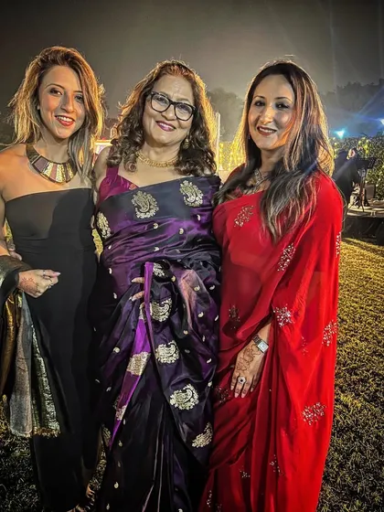 With my beautiful family. I love getting to dress up and celebrate together during festive occasions.