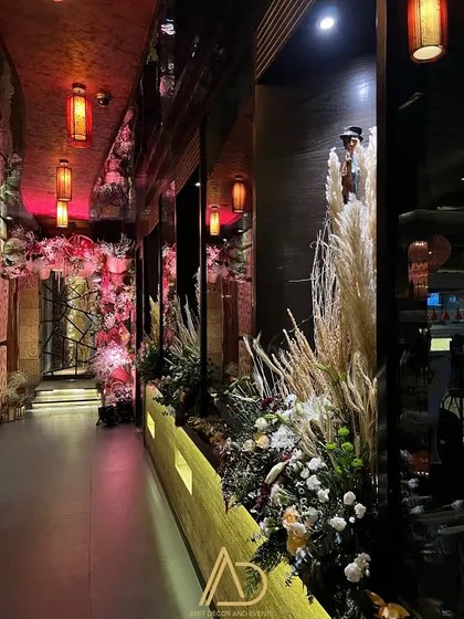 The entrance to the party was designed with an impressive display of pampas grass and dried florals, setting a warm and inviting tone from the moment guests arrived.