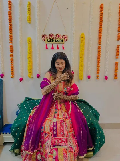 Another lovely shot from Shrutika's mehendi ceremony. She looks serene and beautiful.