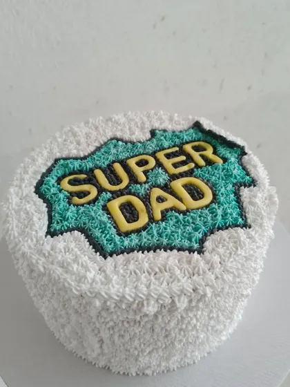 A fun "Super Dad" themed cake to celebrate your hero. The design is piped with buttercream, making the whole cake a delicious treat for Father's Day.