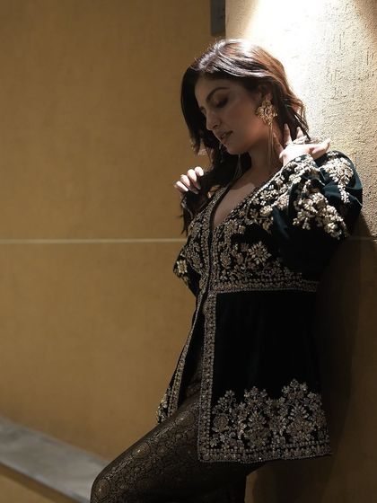 Another shot of Rupali Jagga, giving a closer look at how our large, artistic silver ring complements her elegant, embroidered ensemble.