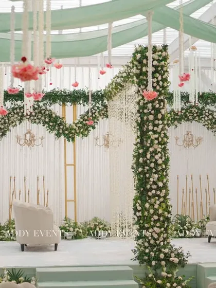 We honor traditions with elegance and grace. This serene Nikah stage, designed for Khan Sir's wedding, features a pastel green and white palette with delicate floral arches, showcasing our versatility in creating culturally rich and sophisticated events.