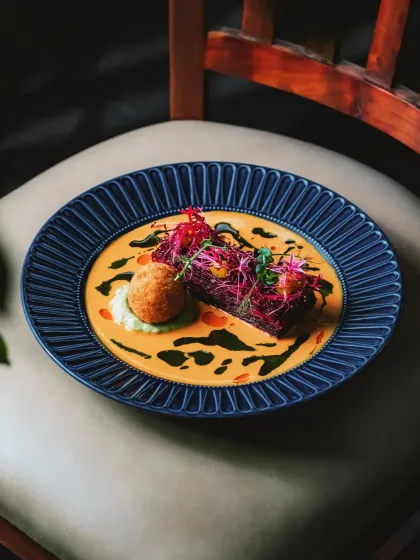 Our baked beetroot and carrot pavé, a colorful and inventive vegetarian dish where flavors combine in a medley of familiar comfort and inspiration.