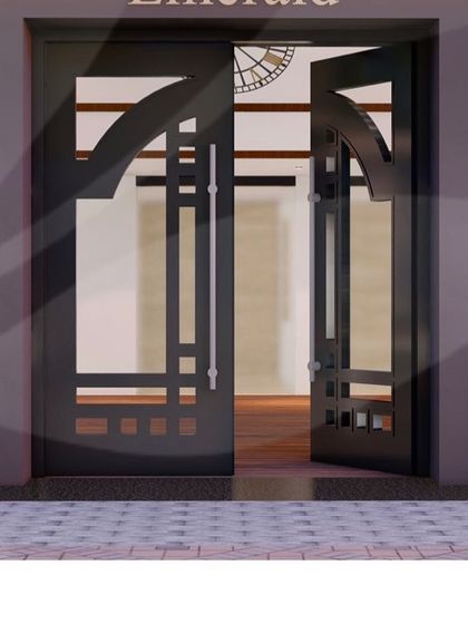 The custom-designed art deco style doors for the Emerald tower foyer. These doors are not just an entry point but a statement piece, reflecting the building's overall luxurious character.