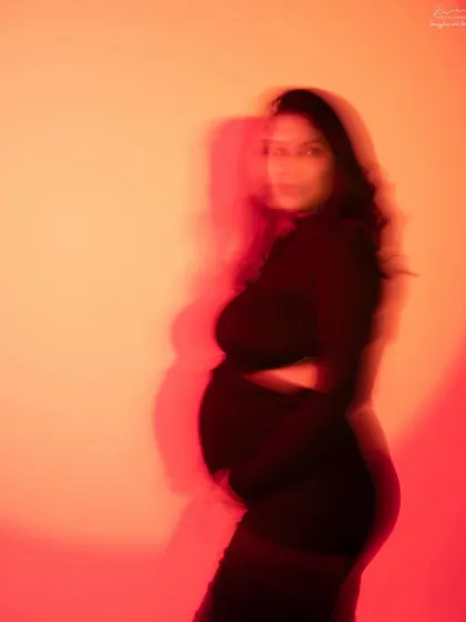 Another take on the motion-blur technique with warm red and orange tones. The result is an abstract and artistic portrait full of energy and life.