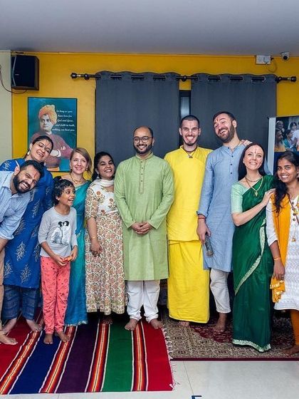 A group photo capturing the happy faces and diverse community that came together for a Bhakti Immersion kirtan event at our studio.