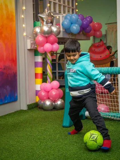 Time for a game of soccer! Our soft turf area is perfect for a friendly match.
