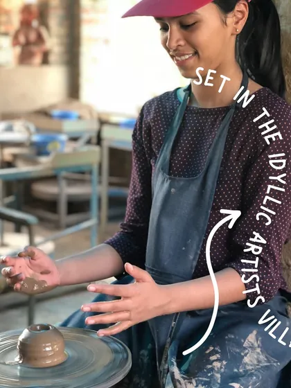 Exploring local crafts is part of the cultural immersion at our Andretta retreat. Here, a participant tries her hand at pottery, a meditative practice that grounds you in the present moment.