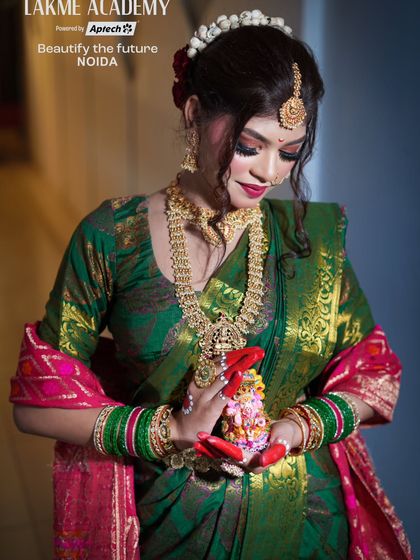 This image shows the model holding a Ganesha idol, tying the makeup look to the festive theme. We encourage our students to think creatively about their portfolio shoots.