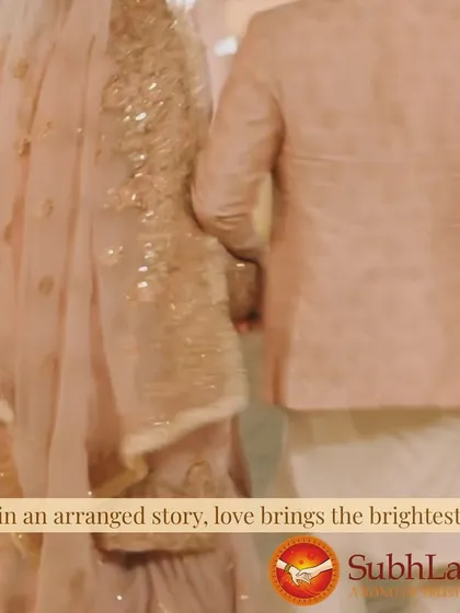 A bride and groom walk together, their pastel outfits glowing. Even in an arranged story, we believe love brings the brightest light.