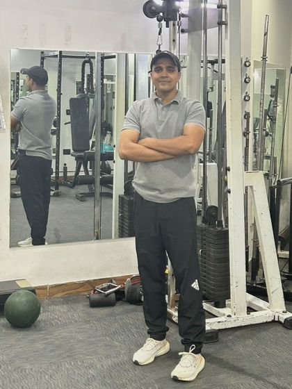 A moment of reflection in the gym. My focus is always on helping my clients succeed.