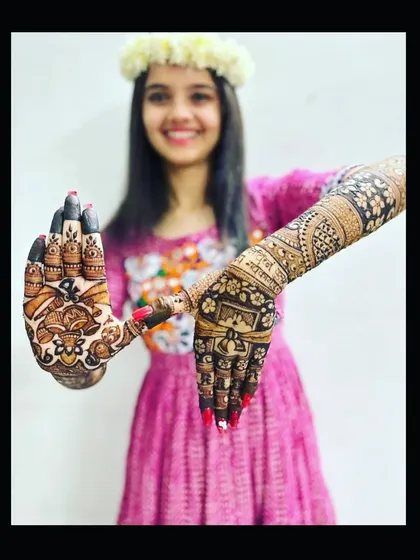 This bride is showing the detailed portrait work on her palms. It's always a pleasure to create something so personal and meaningful for my clients.