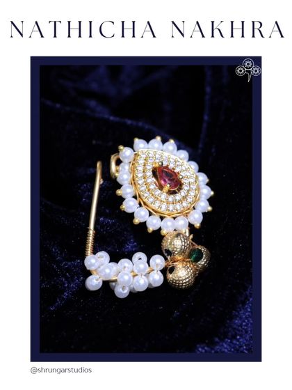 The 'Nathicha Nakhra' is real! This beautiful pearl and stone nath is a must-have for any Maharashtrian bride.