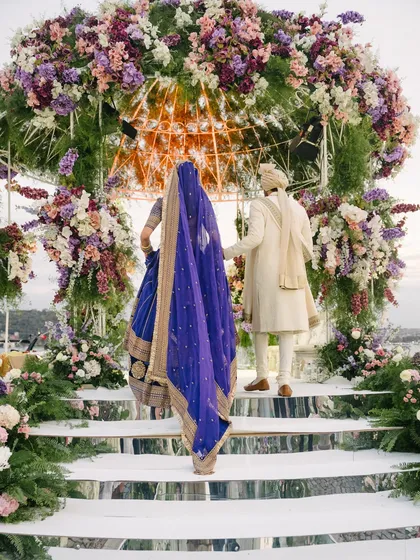 As the couple ascends the mirrored steps of their floral mandap, it symbolizes the beginning of their new journey together. We design these moments to be as meaningful as they are magnificent.