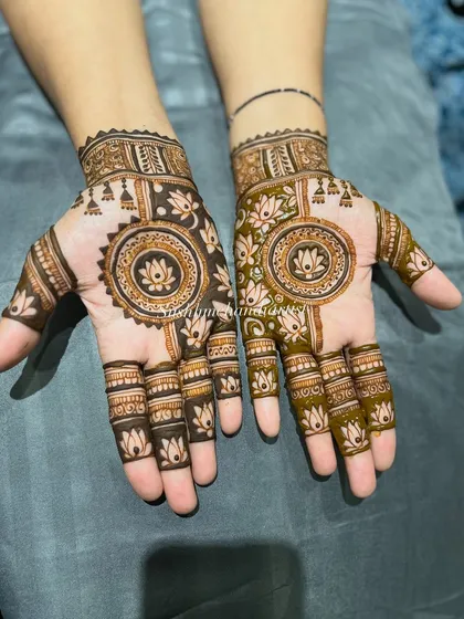 A lovely mandala design with lotus motifs. This style is very popular for guests and bridesmaids who want something elegant and not too heavy.