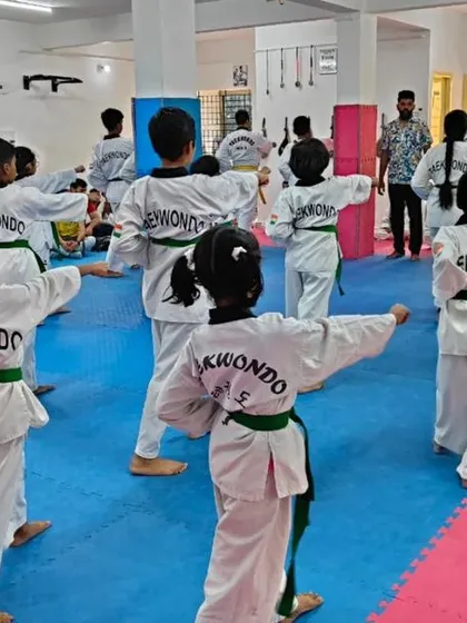 Another angle of the class practicing their forms.
