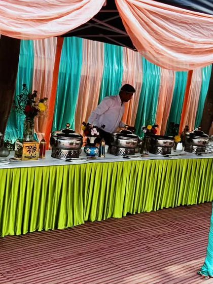 A colorful outdoor setup for a Republic Day celebration I catered for 150 guests in DLF Phase 2. The vibrant tenting and decor added to the festive spirit.
